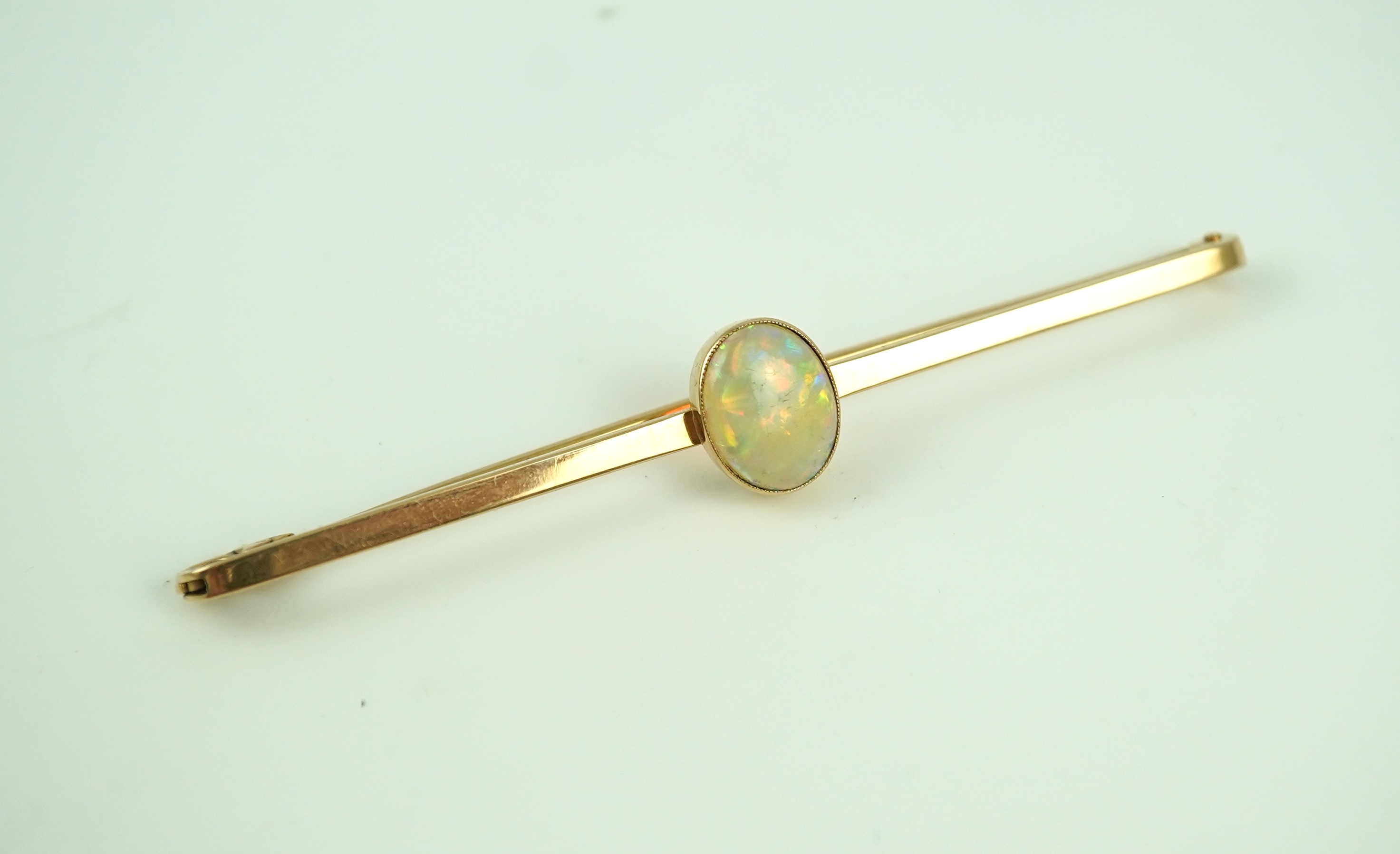 An Edwardian gold and opal brooch, early 20th century